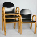 Four Danish bentwood stacking chairs by Hyllinge Mobler, the seats in black, label to bases.