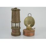 A Hockley & Limelight miners lamp together with a copper lamp possibly railway related stamped BR