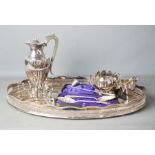 A quantity of silver plateware to include large oval tray, flower frog, teapot, coffee pot, jug,