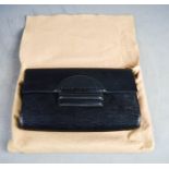A Louis Vuitton of Paris Epi leather Honfleur clutch bag, with original felt slip.