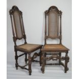 A pair of Queen Anne walnut hall chairs - 127cm high