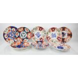 A group of eight Imari 19th century plates with scalloped edges, all approximately 22cm diameter.