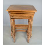 A nest of four mahogany tables.