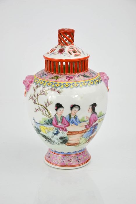 A 20th century porcelain Chinese vase and cover.