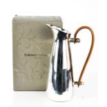 A boxed Culinary Concepts water pitcher