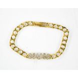 A 9ct gold bracelet with 'Mum' to the centre encrusted in diamonds, 8.6g.