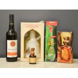 A Bells Whisky bottle, boxed, together with a bottle of Amaretto, Tunel and a miniature.