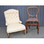 A Victorian cream nursing chair together with a balloon back chair