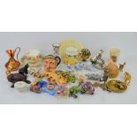 A group of collectibles to include cast iron frog , Royal Doulton , Crestware, etc