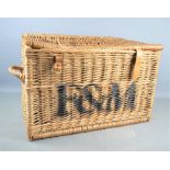 A vintage F&M wicker basket