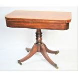 A 19th century mahogany card table.