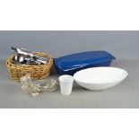 A Mone Yewson ceramic 'plastic' mug, and glass lion formed dish, cutlery and fish dish.