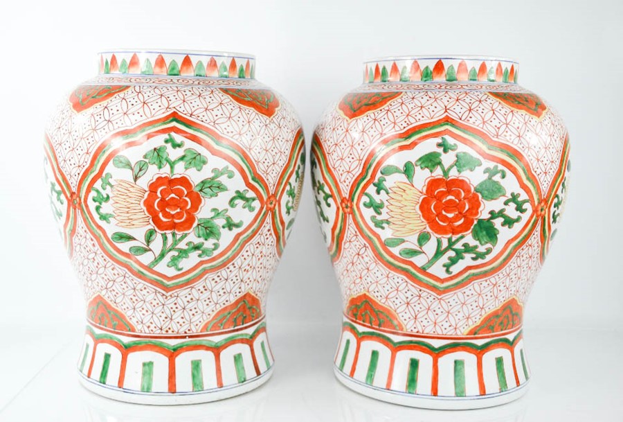 A pair of 20th century Chinese baluster vases, with floral decoration, 36cm high.