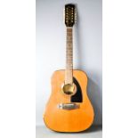 An Eko twelve string acoustic electric guitar