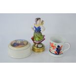 A Prattware pot and lid together with a Sitzendorf figurine and an imari-style cup