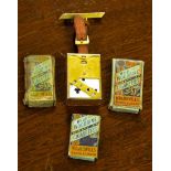 Three packets of miniature Wild Woodbine cigarettes and a miniature set of playing cards in brass