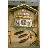 A Black Forest style German cuckoo clock.