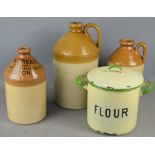 Three stoneware flagons one belonging to J.W. Green brewers Luton and an enamel flour bin