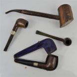 A group of vintage smoking pipes to include a silver collared example - various makes to include