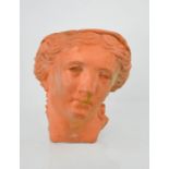 A terracotta wall planter in the form of a classical female head, 30 by 27 by 23cm.