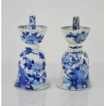 A late 18th / early 19th century pair of blue and white Delft bell form incense holders.