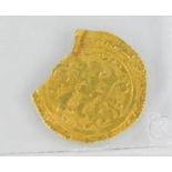 A Middle Eastern Saljouq gold coin, approximately 1103 A.D., for Almstanjid, Billah Mahmoud Bin