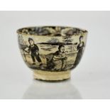 A 19th century brown and white bowl, depicting children playing in a garden, 4cm high.