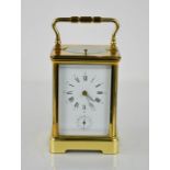 A brass carriage clock.