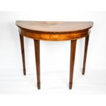 A Sheraton Revival demi lune mahogany side table, with fan inlay, raised on tapering legs and