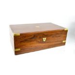 A 19th century Rosewood writing slope with brass inlaid corners