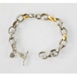 A Dower & Hall chain link bracelet with three gold links