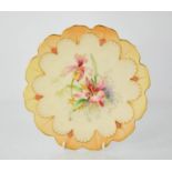 A Royal Worcester plate decorated with flowers, date code 1903.