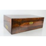 A 19th century solid rosewood writing slope with drawer to the side