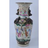 A 19th century Chinese stoneware vase decorated with salamanders and dogs of Fo with mark to base