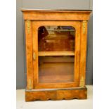 A Victorian figured walnut pier cabinet, with ebonised and cross banded top with further