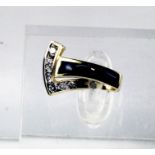 A 14ct yellow gold diamond and onyx pendant, diamonds approximately 0.40cts, 3.6g