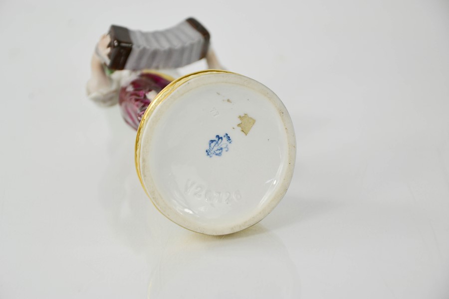 A Meissen porcelain figure of a seated lady holding a clam shell, together with a Sitzendorf - Image 3 of 7