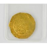 A Middle Eastern Dharb Oman gold coin, approximately 943 A.D. for A.L Sultan Al Moizz LiDein-
