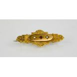 A 9ct gold Victorian sweetheart brooch, Chester 1895, with locket back, 3.2g.