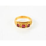 A gold and pink sapphire ring - hallmarked 800 [19.2ct] Size O/P 3.2g