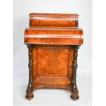 A Victorian burr walnut piano top Davenport desk, with pop up mechanism, operated by a concealed