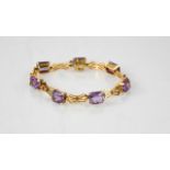 A 9ct gold and amethyst bracelet, rectangular cut - 18cm - 14.9g