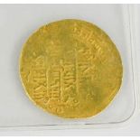 A Middle Eastern Souq Ahwaz gold coin, approximately 947 A.D. with certificate of authenticity.