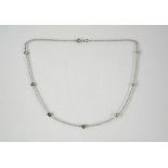 An 18ct white gold and diamond necklace, 4.8g.