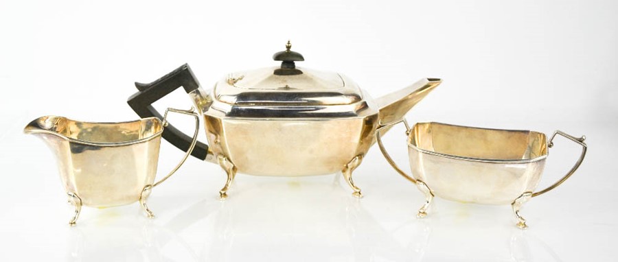 A George V three piece silver tea set, Birmingham 1933, 1150g.