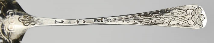 A silver sifter spoon, London 1735, the bowl embossed with flowers, and birds. - Image 3 of 3