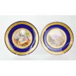 A pair of 19th century Minton plates, painted with named views on reverse, 24cm diameter.