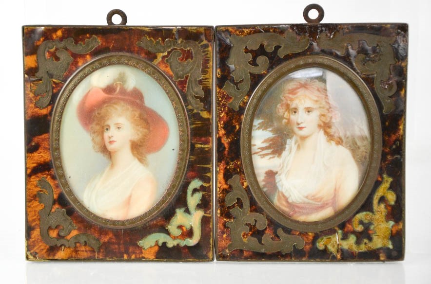 A pair of 18th century portrait miniatures, oil on ivory, in tortoiseshell frames.