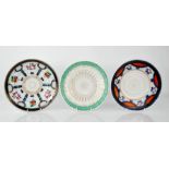 Three 19th century Russian dishes, including one Dulevo S T Kuznetsov 1832 example, 23cm diameter.