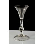 A Georgian glass with air-bubble and knop stem, 16cm high.
